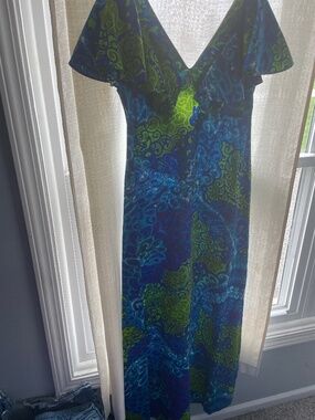 Kimi’s at King’s Alley Flutter Sleeve Maxi Dress